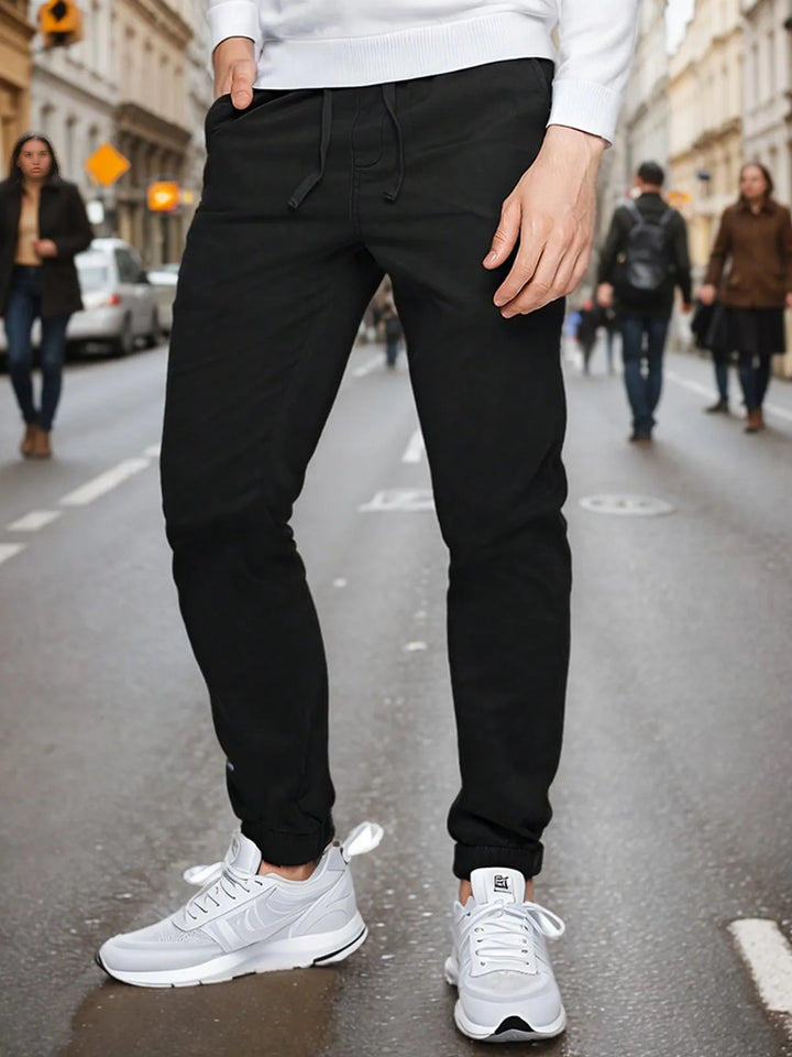 "Men's Elastic Waist Drawstring Jogger Pants with Elastic Cuffs, Comfortable and Casual, Perfect for Sports and Everyday Wear"