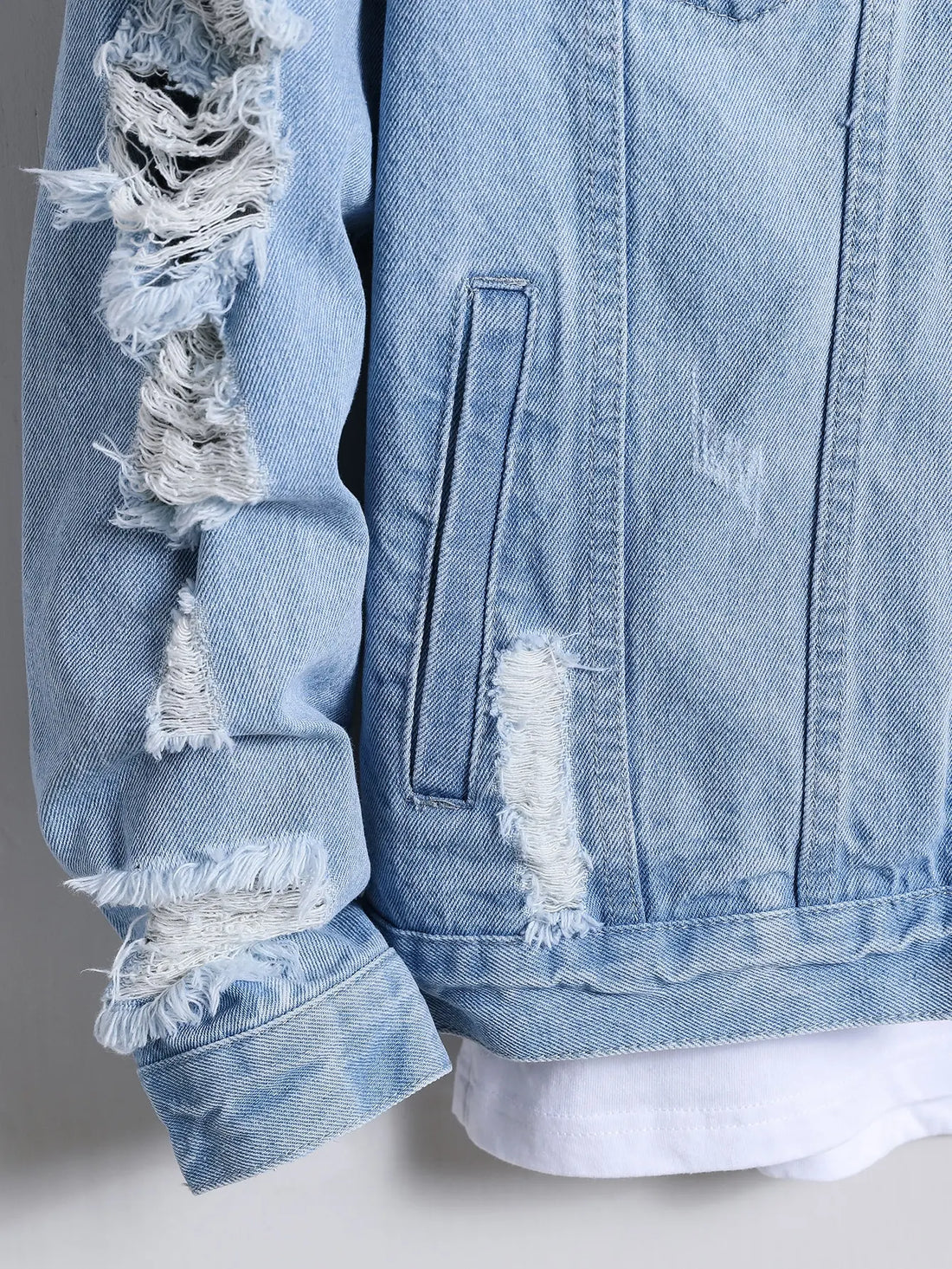 Men's denim jacket for spring and autumn. Light blue ripped denim jacket. Street trend style. Daily casual.