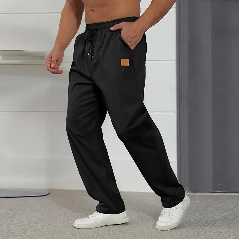 Men s Relaxed Fit Cargo Pants with Adjustable Drawstring Waistband and Multiple Pockets for Everyday Wear Halalzen UK