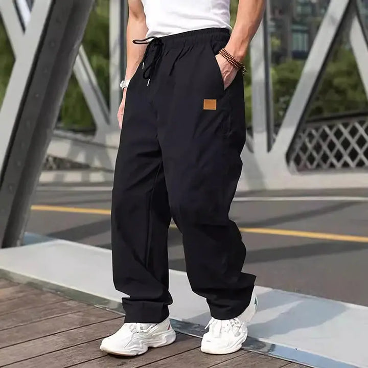 Men s Relaxed Fit Cargo Pants with Adjustable Drawstring Waistband and Multiple Pockets for Everyday Wear Halalzen UK