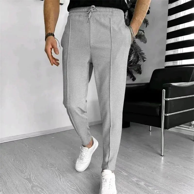 Men s Casual Elastic Waist Drawstring Trousers with Pockets Solid Color Streetwear Pants for Everyday Comfort Halalzen UK