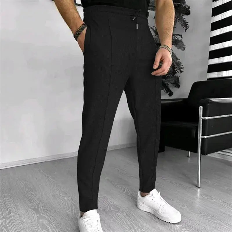 Men s Casual Elastic Waist Drawstring Trousers with Pockets Solid Color Streetwear Pants for Everyday Comfort Halalzen UK