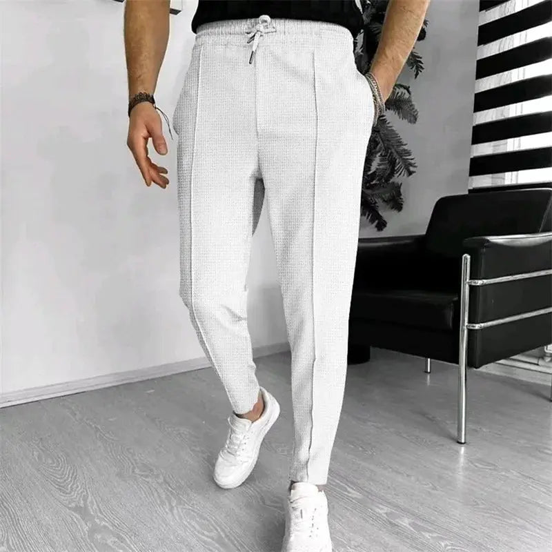 Men s Casual Elastic Waist Drawstring Trousers with Pockets Solid Color Streetwear Pants for Everyday Comfort Halalzen UK