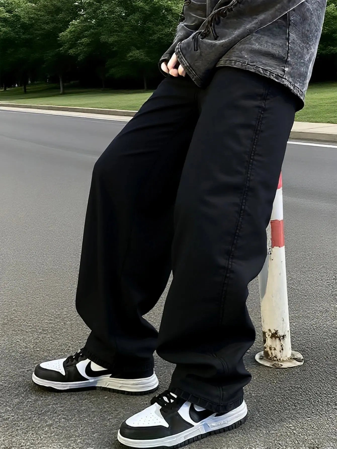 Men's black wide-leg jeans, loose and flowing, simple and versatile, easily creating street fashion and casual everyday style. Halalzen UK