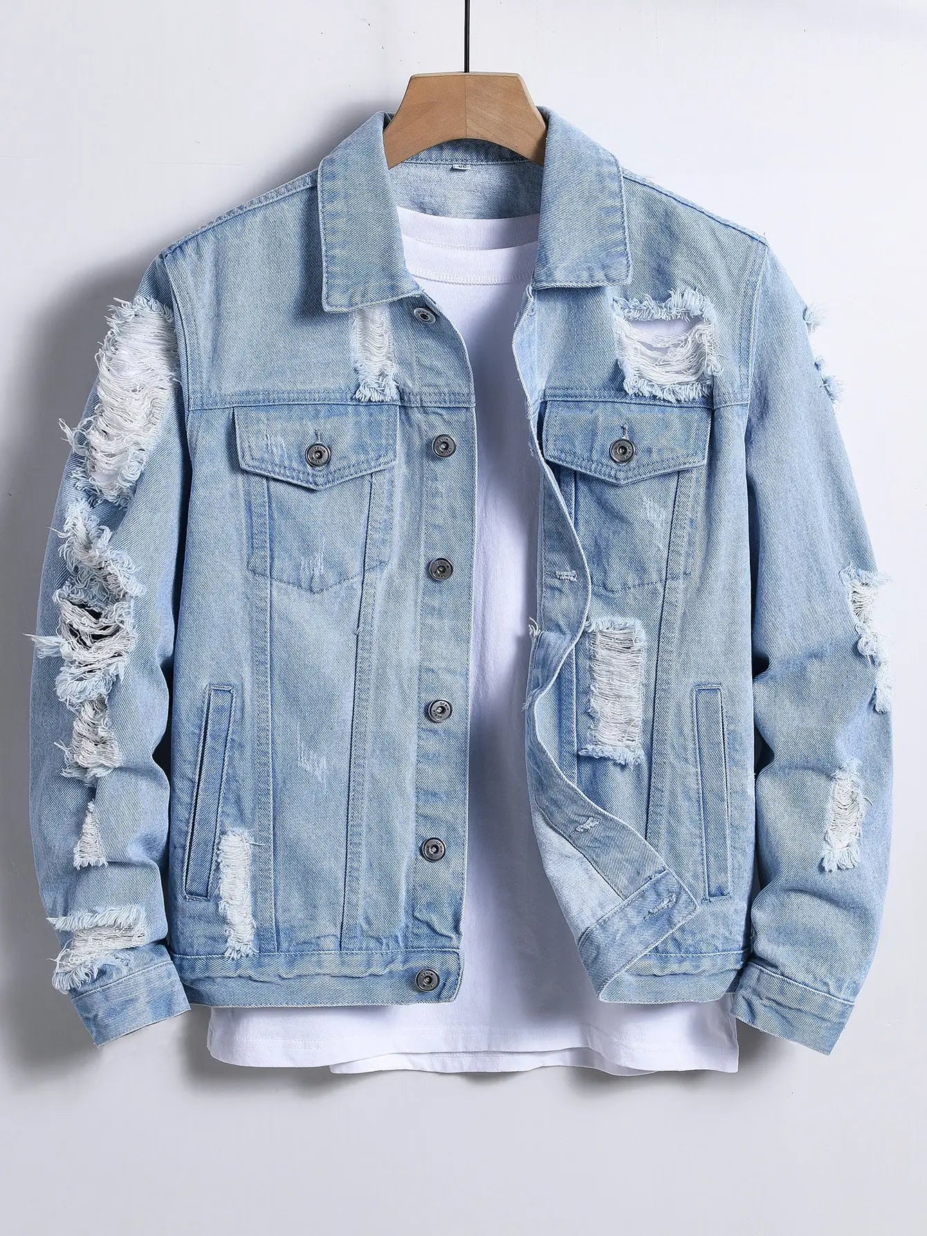 Men's denim jacket for spring and autumn. Light blue ripped denim jacket. Street trend style. Daily casual.